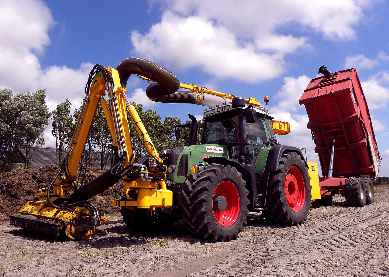 tractor with suction harvester